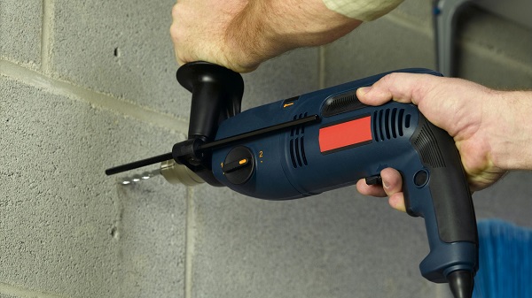 How to drill into concrete wall