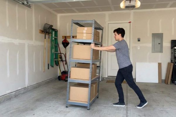 Securing a shaky garage rack against a concrete wall